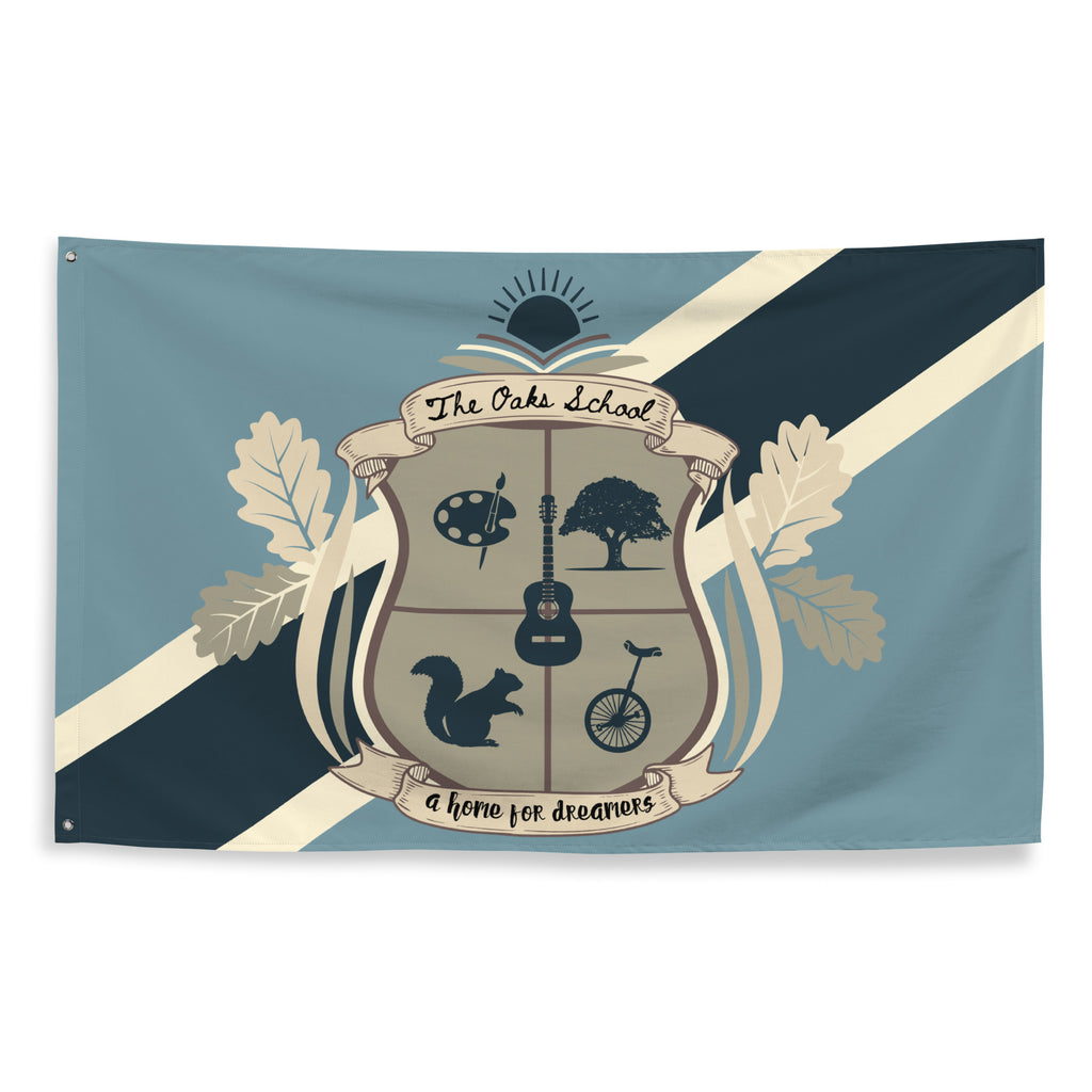 Product mockup: Illustration of a navy, blue, and cream colored flag on a white background featuring a crest with an art palette, oak tree, squirrel, guitar, and unicycle and a thick diagonal stripe behind the crest.