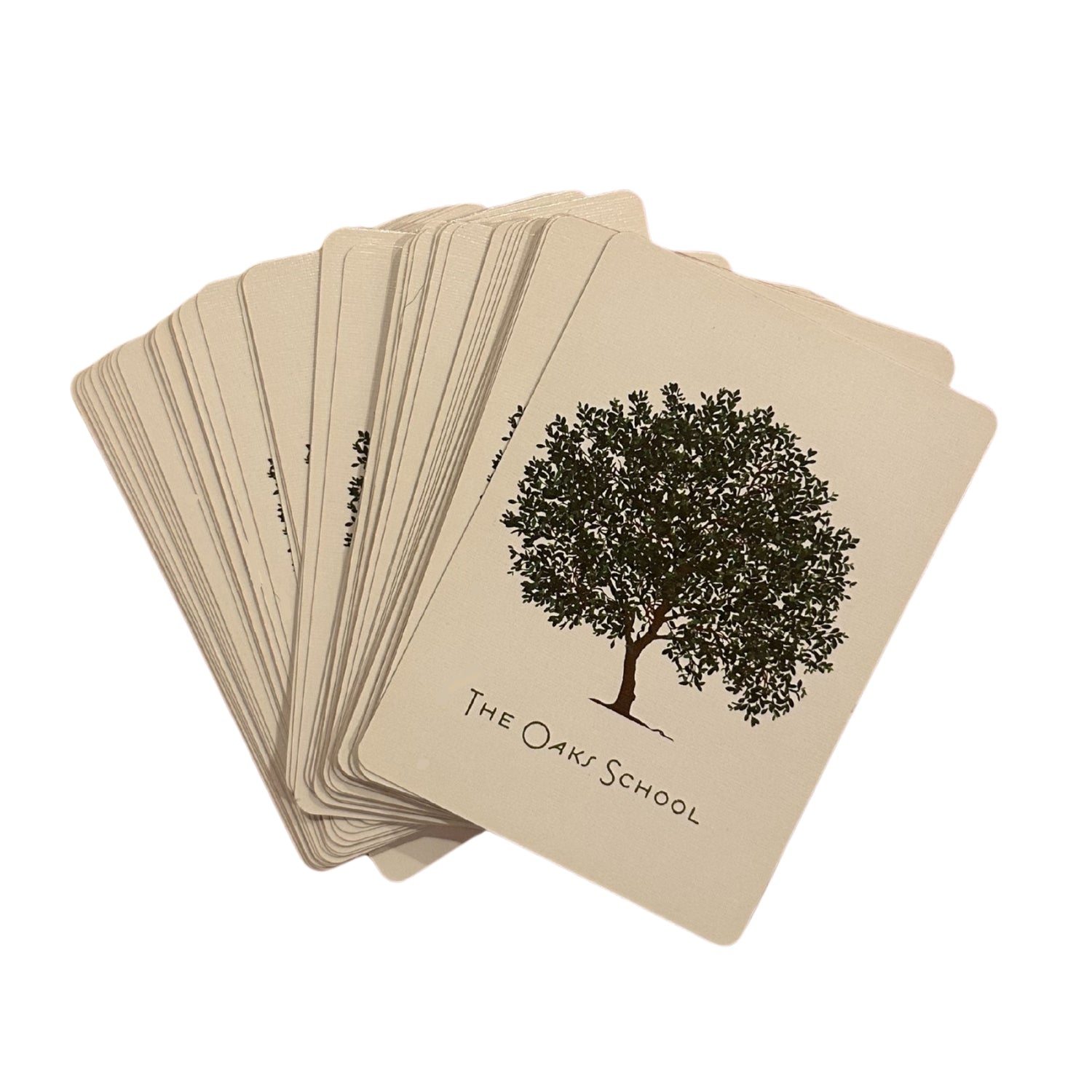 Set of cards with a tree design and 'The Oak School' text on beige background