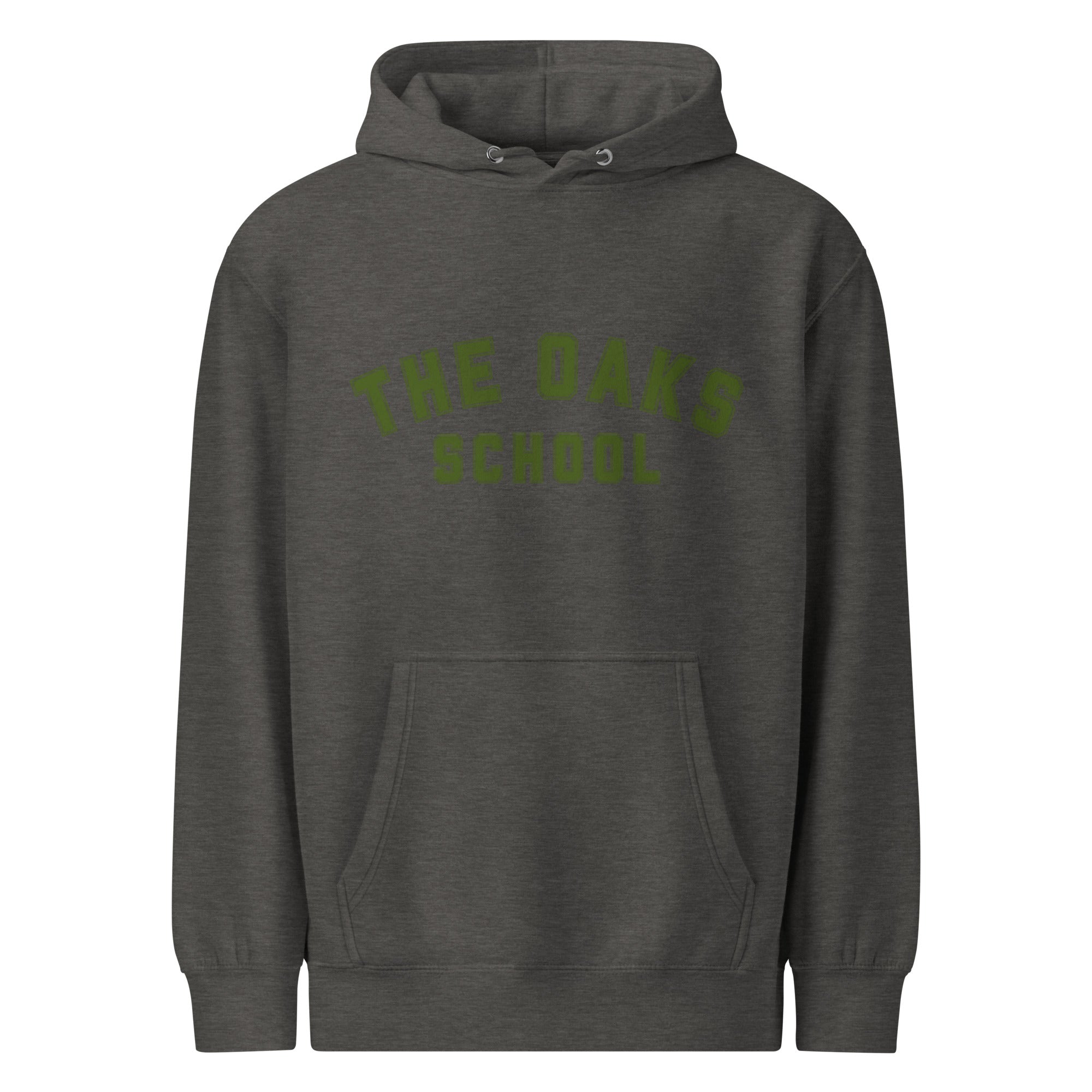 Product mockup: A charcoal heather hoodie on a white background featuring green letters in a collegiate font style that says "The Oaks School"