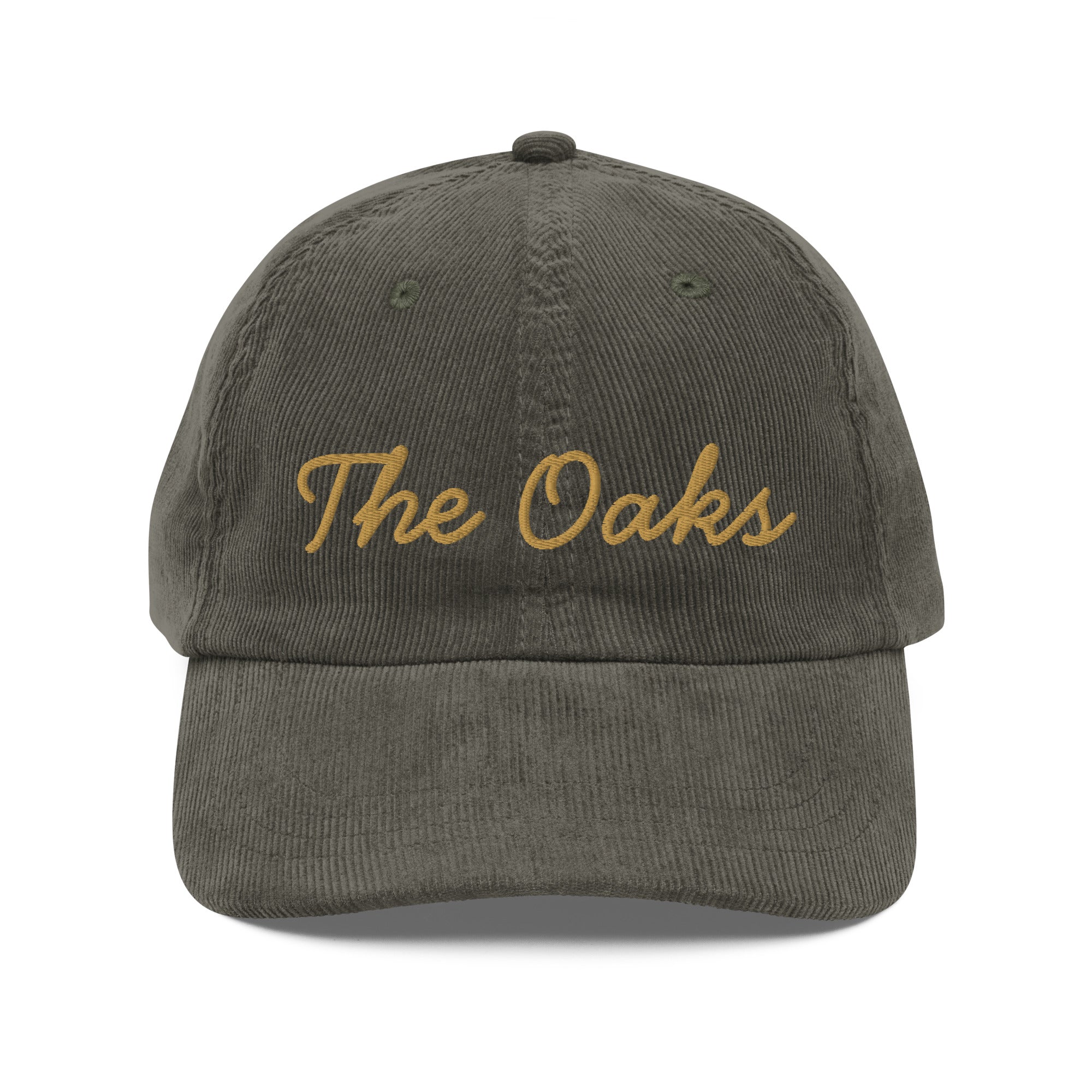 Product mockup: An olive colored corduroy cap on a white background featuring gold lettering in a handwriting font that says "The Oaks"