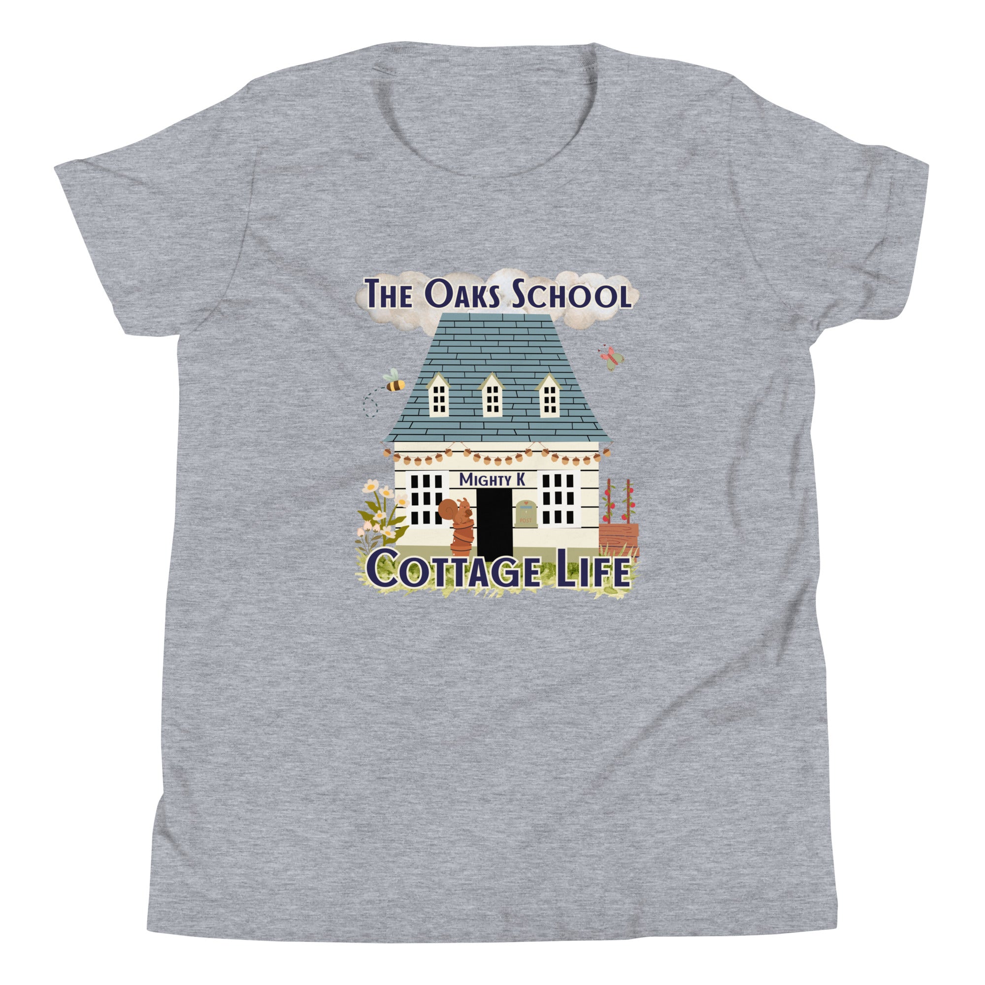 Product mockup: A heather gray tshirt on a white background featuring an illustration of a white cottage and the text "The Oaks School" and "Cottage Life"