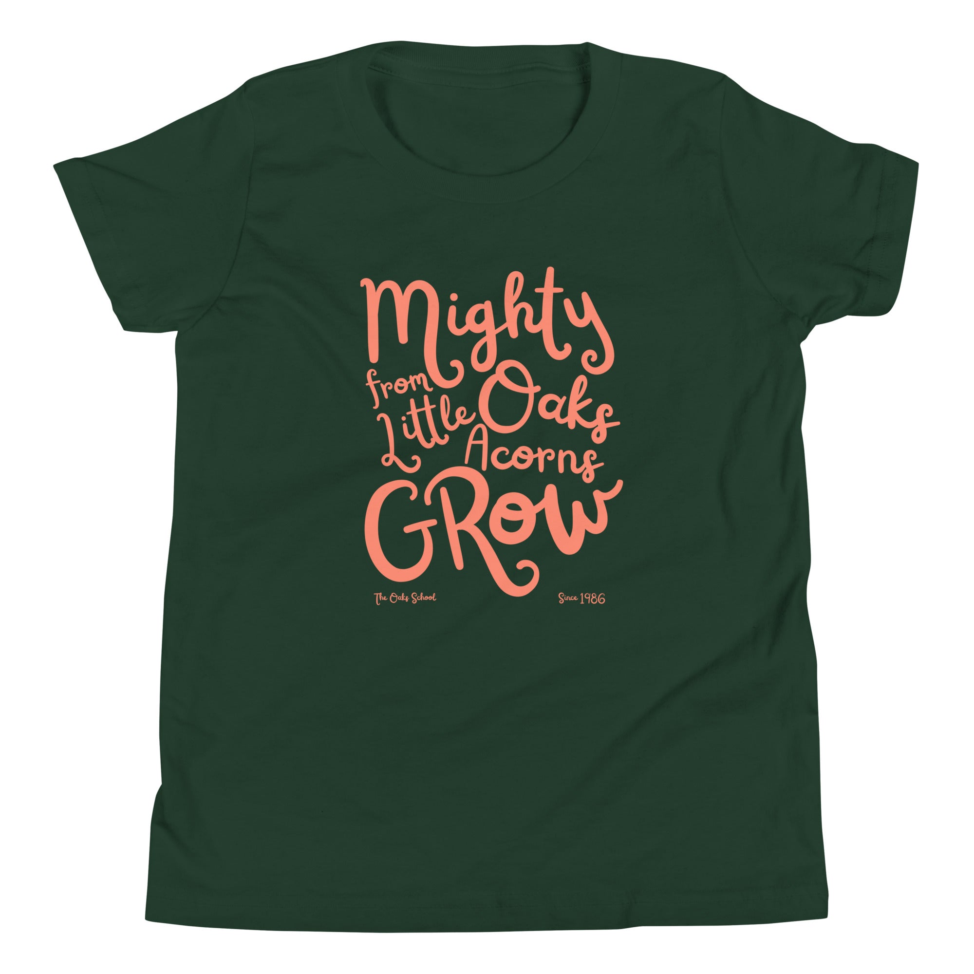 Product mockup: A forest green tshirt on a white background with orange script text that says "Mighty Oaks from Little Acorns Grow" and "The Oaks School Since 1986"
