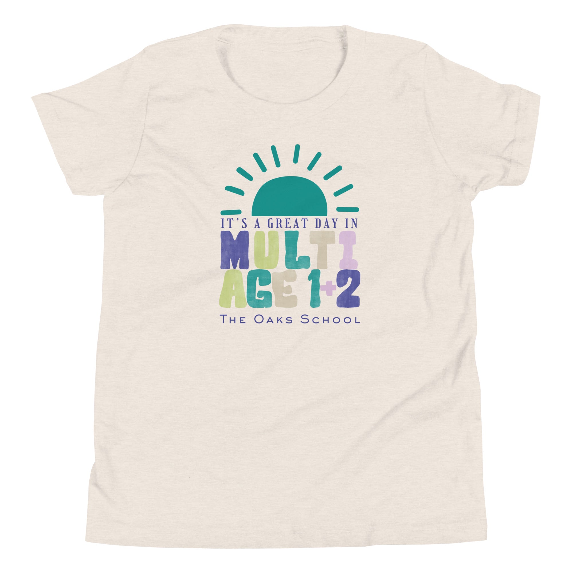Product mockup: Image of heathered dust colored tshirt with a half sun on the horizon and text below that reads "It's a great day in Multiage 1+2" and "The Oaks School"