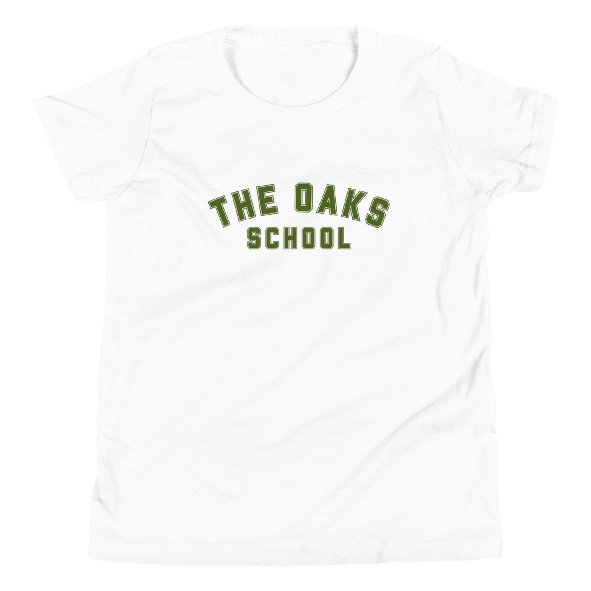 Product mockup: A white tshirt on a white background featuring green collegiate style lettering that says "The Oaks School"